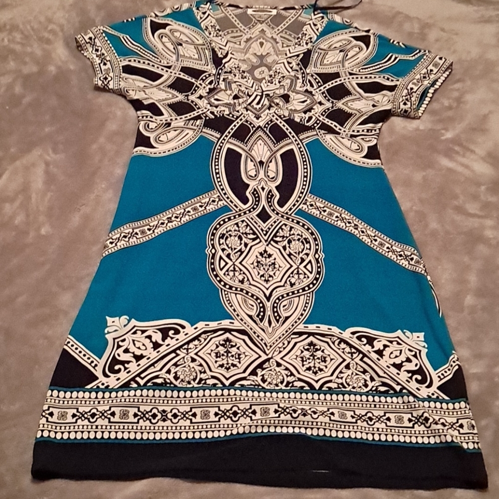Beautiful size 8 dress with full front/back design